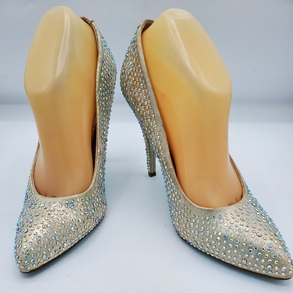 Betsey Johnson silver colored rhinestones pumps.